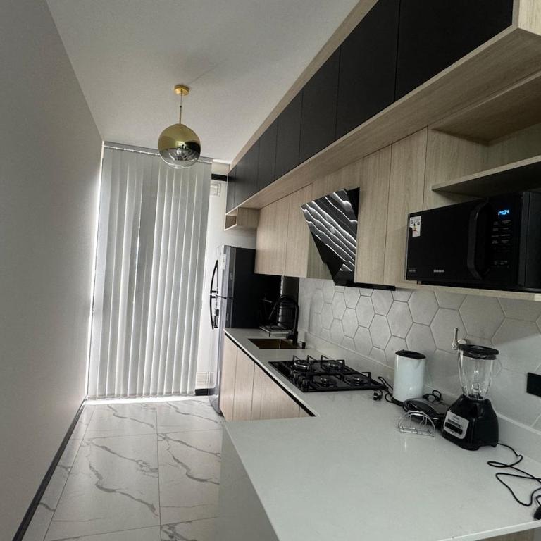 Garzonier en excelente ubicación - Apartamento de 1 dormitorio - 5