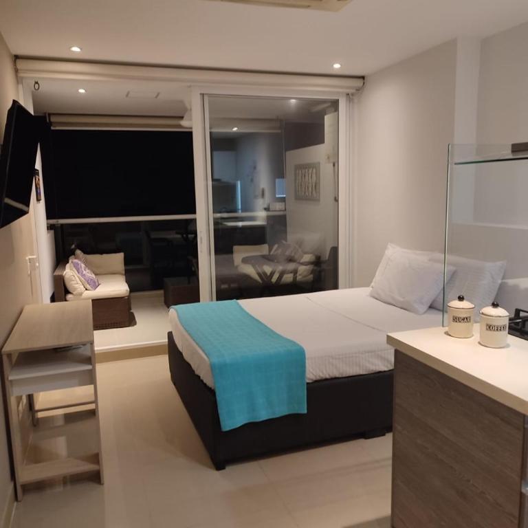 Apartaestudio con hotel y playa - One-Bedroom Apartment - 50