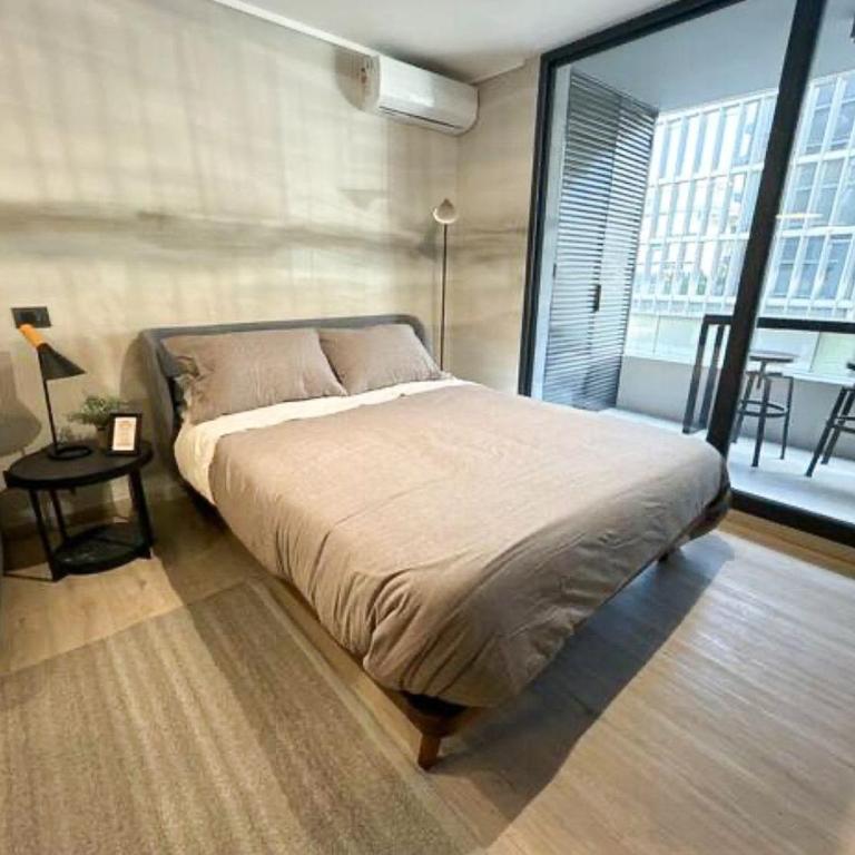 Moderno estudio con aire acondicionado y estacionamiento - One-Bedroom Apartment - 5
