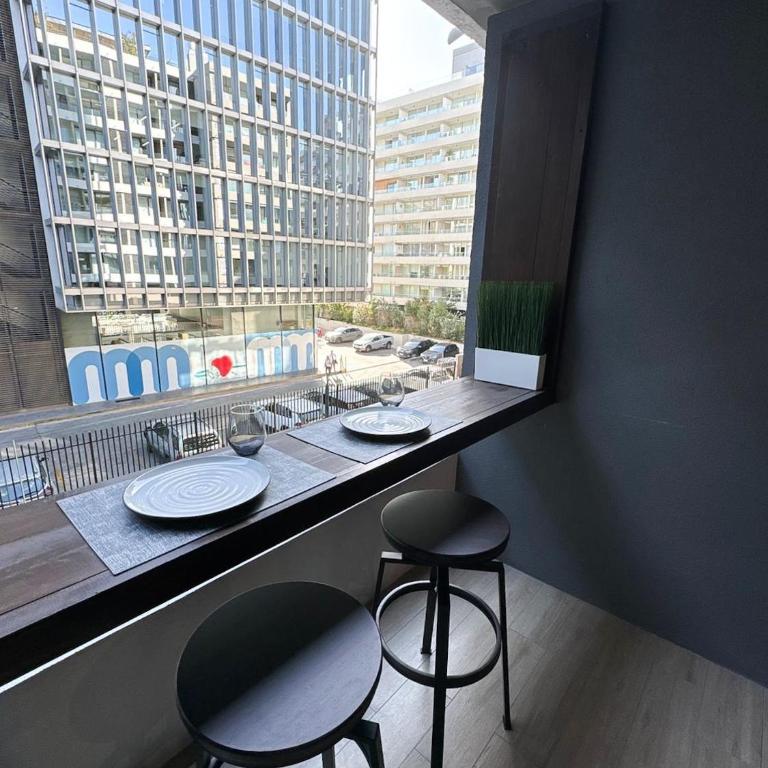 Moderno estudio con aire acondicionado y estacionamiento - One-Bedroom Apartment - 9
