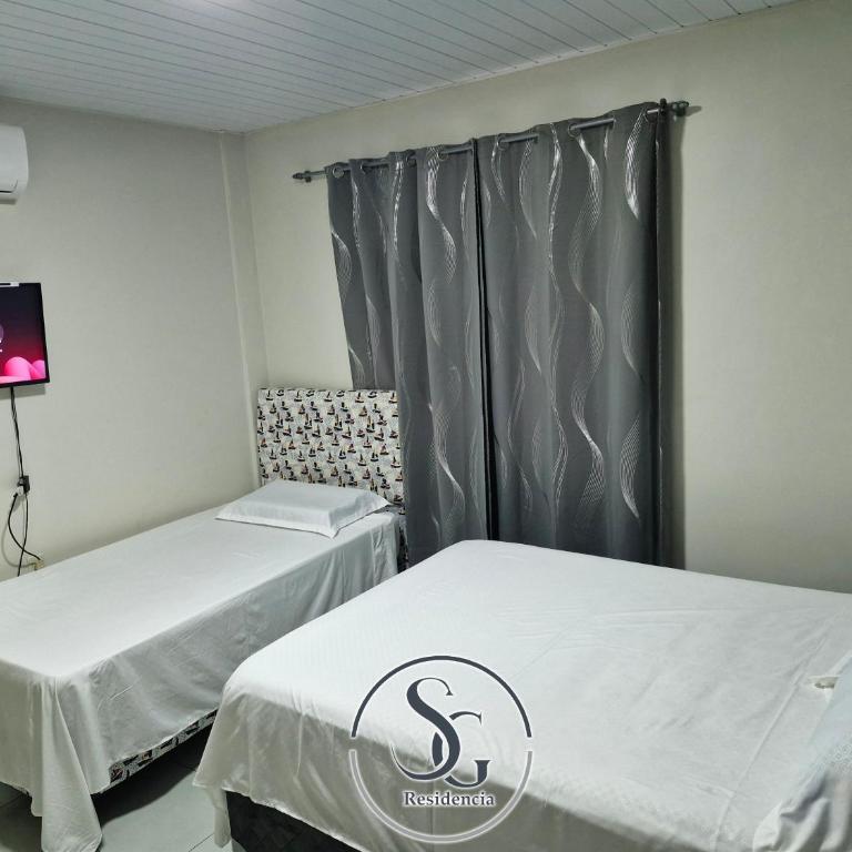 Residencia SG - Casa Duplex - Three-Bedroom House - 24