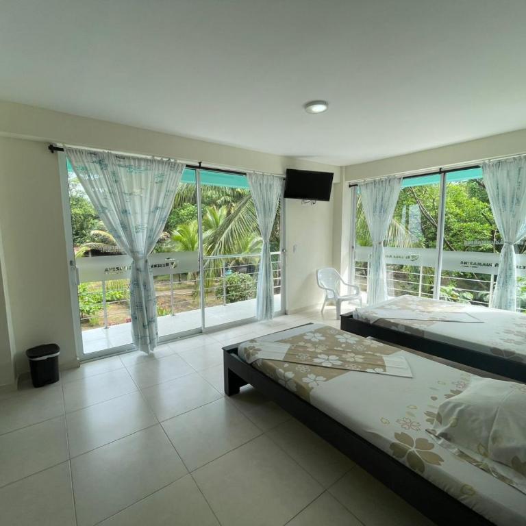 Hotel Reserva Aguamarina - Habitación Triple con balcón - 10