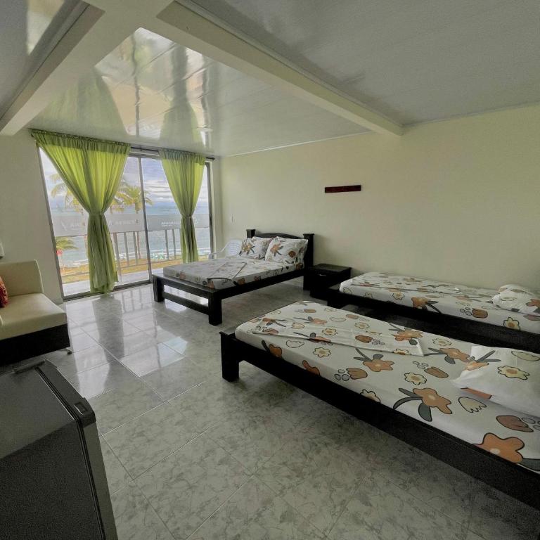 Hotel Reserva Aguamarina - Habitación Triple Confort - 5