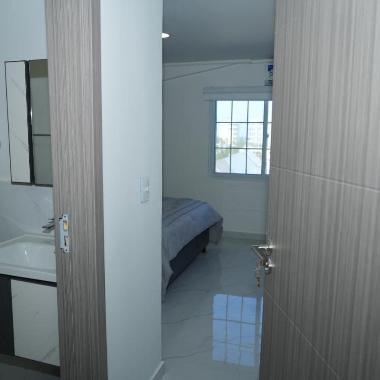 Jhonny Cay Suites - Habitación Cuádruple - vistas al jardín - 2