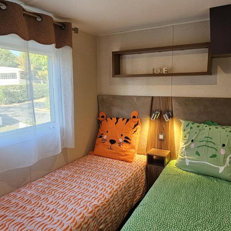 Mobil-home Évasion Valras tout confort 40 m2 - Camping Les Sables du Midi Valras-Plage - Bungalow mit 3 Schlafzimmern - 34