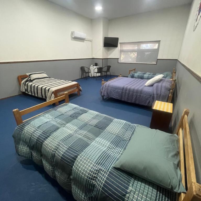 Torres Del Sur Cabañas & Hostal - Habitación Cuádruple Clásica - 1