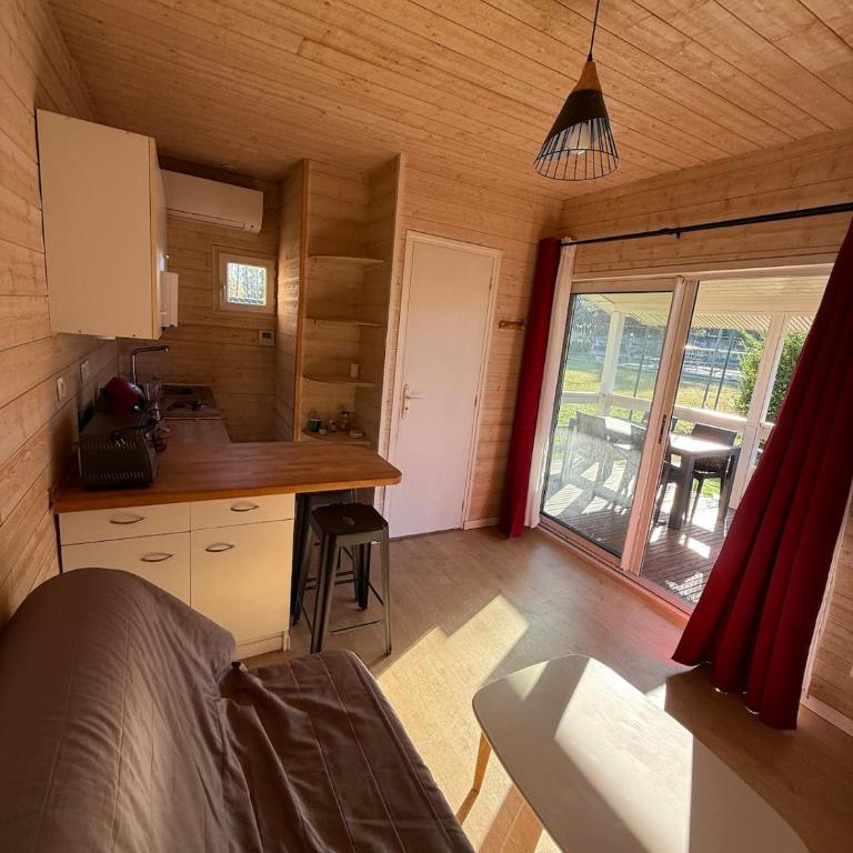 Chalet Boisé, climatisé - Piscine Village Khélus - Chalet 1 Chambre - 11