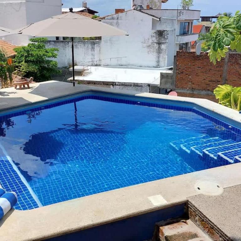 Curiel's Retreat Ocean View 2BR with Terrace and Heated Pool - Two-Bedroom Apartment with Terrace - 2