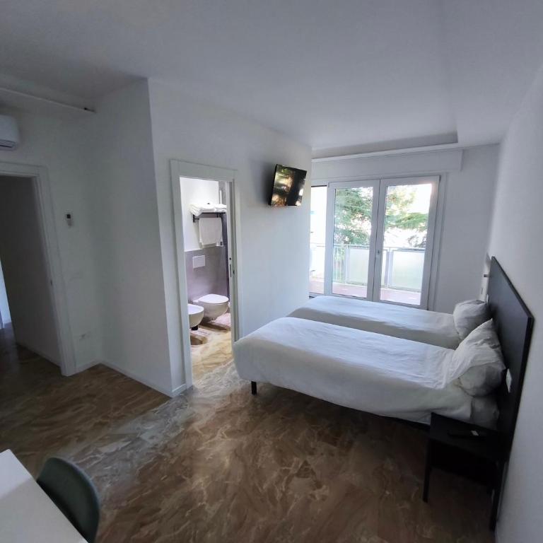 Grace House - Camera Familiare con Bagno Privato - 1