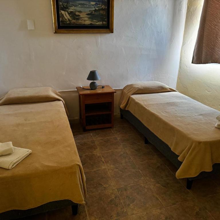 Piriápolis Hostel & suites - Habitación Familiar con baño privado - 11