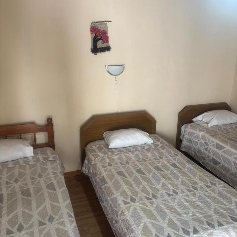 Hostal Pichilemu Travel - Triple Room - 1