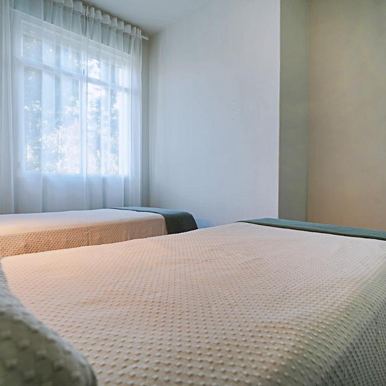 GALIHOST - Apartamentos con jardín en el centro de Sanxenxo - Apartamento de 4 habitaciones - 45