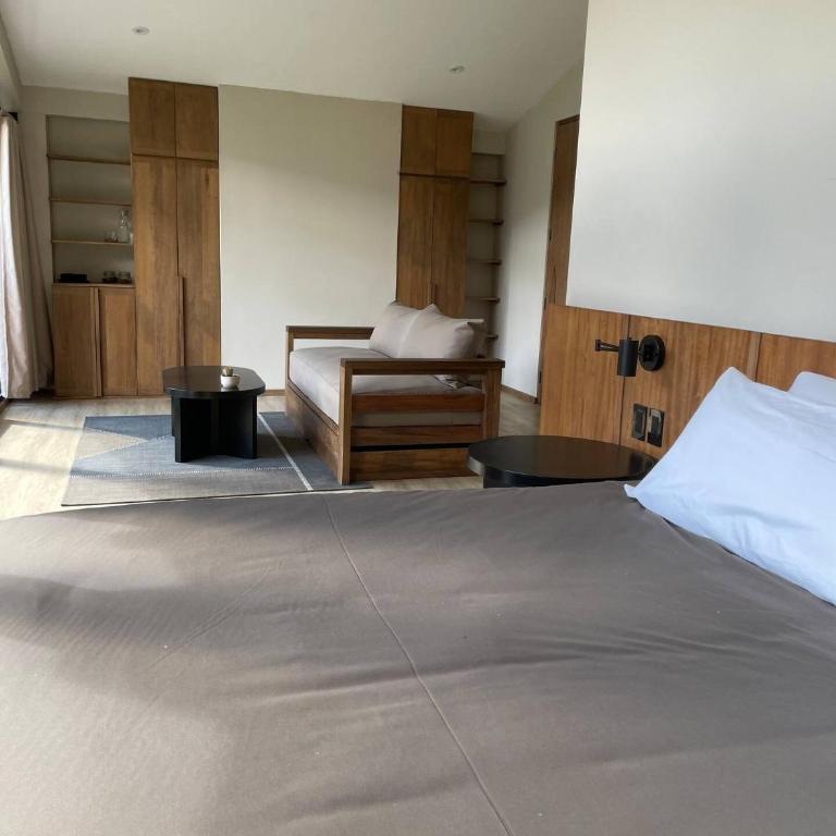 Earth Tones Tiny Homes & Suites - King Suite with Balcony - 8