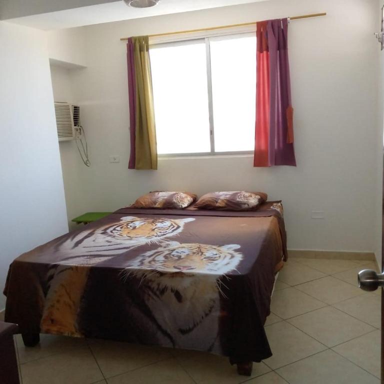 Departamento en el Hotel las Palmeras - Three-Bedroom Apartment - 13