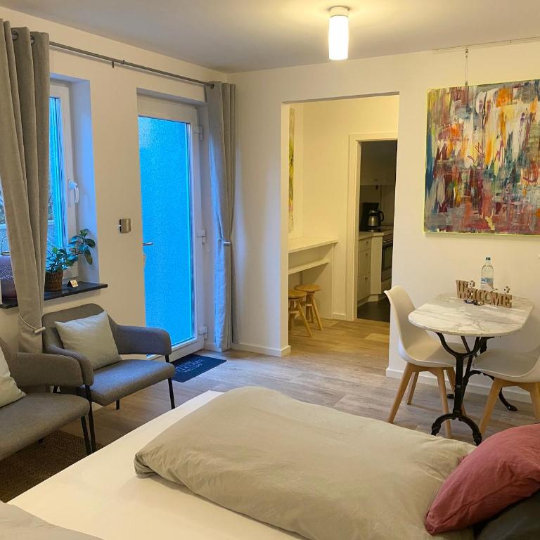 Helle Souterrainwohnung mit Komfort - Appartement 1 Chambre - 1