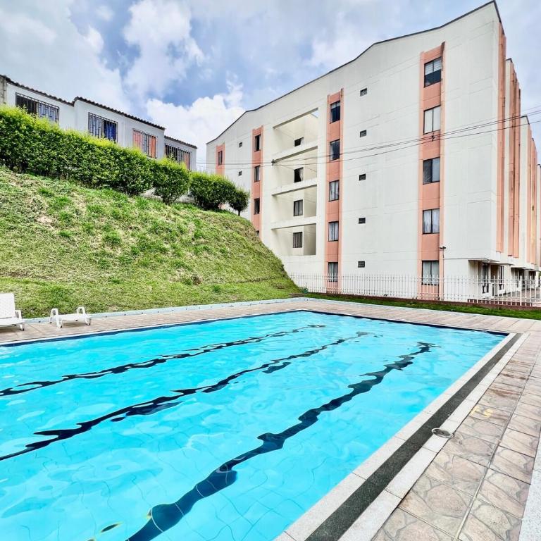 Apartamento 3 habitaciones cerca del Aeropuerto Matecaña Piscina y zonas recreativas Hasta 9 huéspedes - Three-Bedroom Apartment - 36