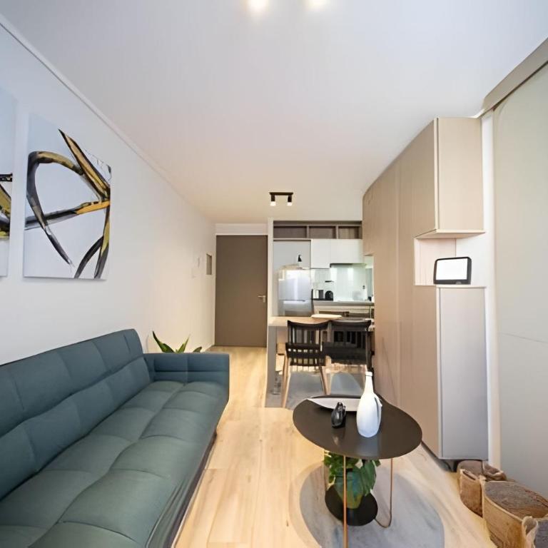 Condor Suites Executive Santiago Centro offers a terrace, barbecue, and Wi-Fi - Apartment with Balcony - 4