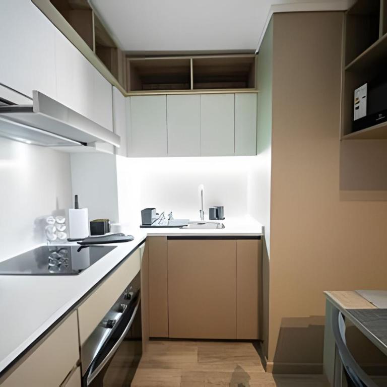 Condor Suites Executive Santiago Centro offers a terrace, barbecue, and Wi-Fi - Apartment with Balcony - 7