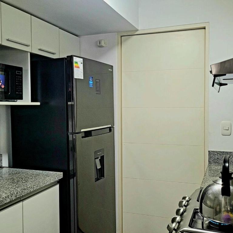 Unidos en Familia - Three-Bedroom Apartment - 22