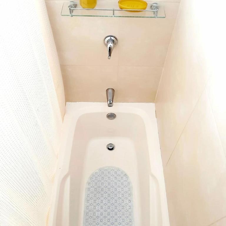 Unidos en Familia - Three-Bedroom Apartment - 24