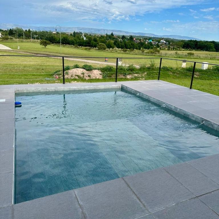 Duplex con pileta frente a lago Los Molinos - Two-Bedroom House - 18