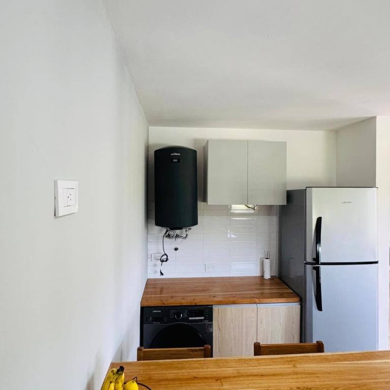 Duplex con pileta frente a lago Los Molinos - Two-Bedroom House - 13
