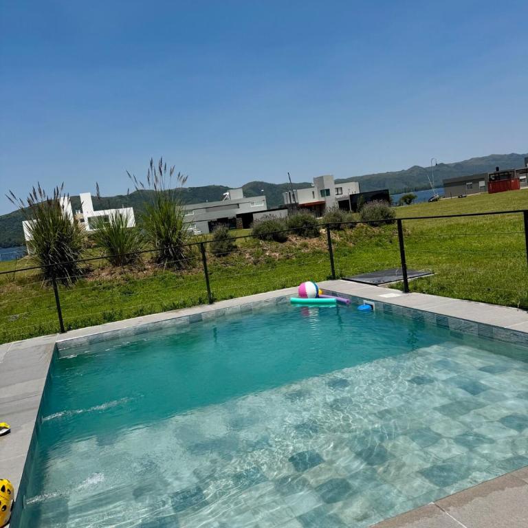 Duplex con pileta frente a lago Los Molinos - Two-Bedroom House - 19