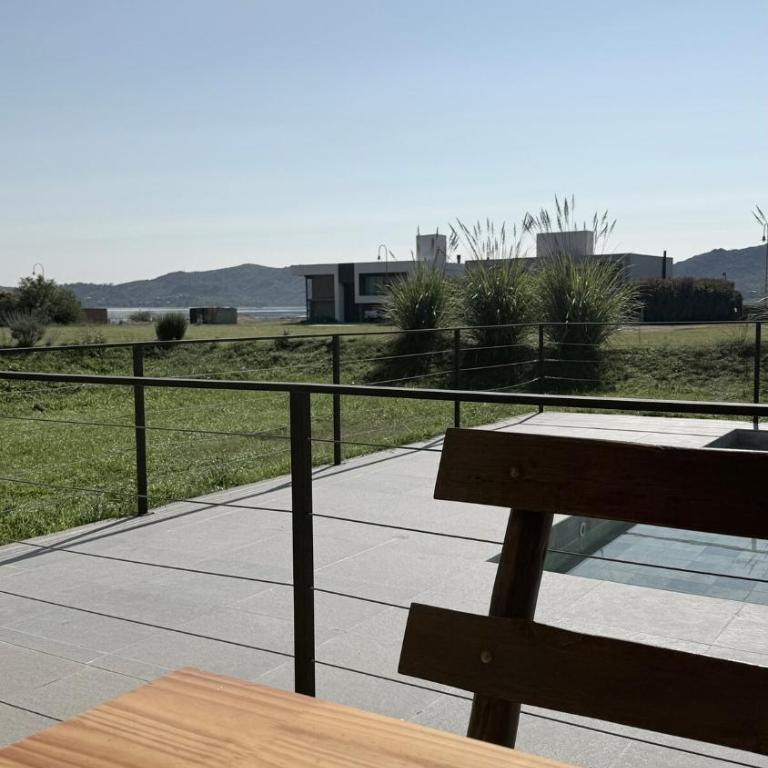 Duplex con pileta frente a lago Los Molinos - Two-Bedroom House - 21