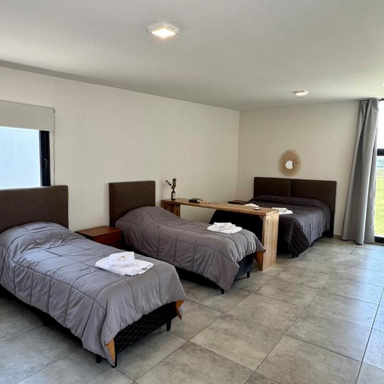 Duplex con pileta frente a lago Los Molinos - Two-Bedroom House - 5