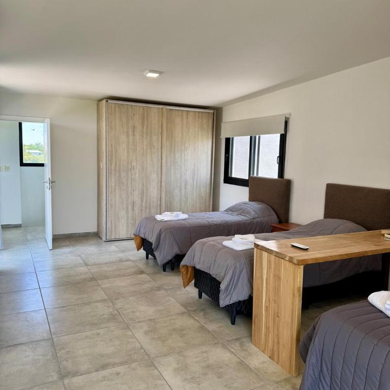 Duplex con pileta frente a lago Los Molinos - Two-Bedroom House - 48