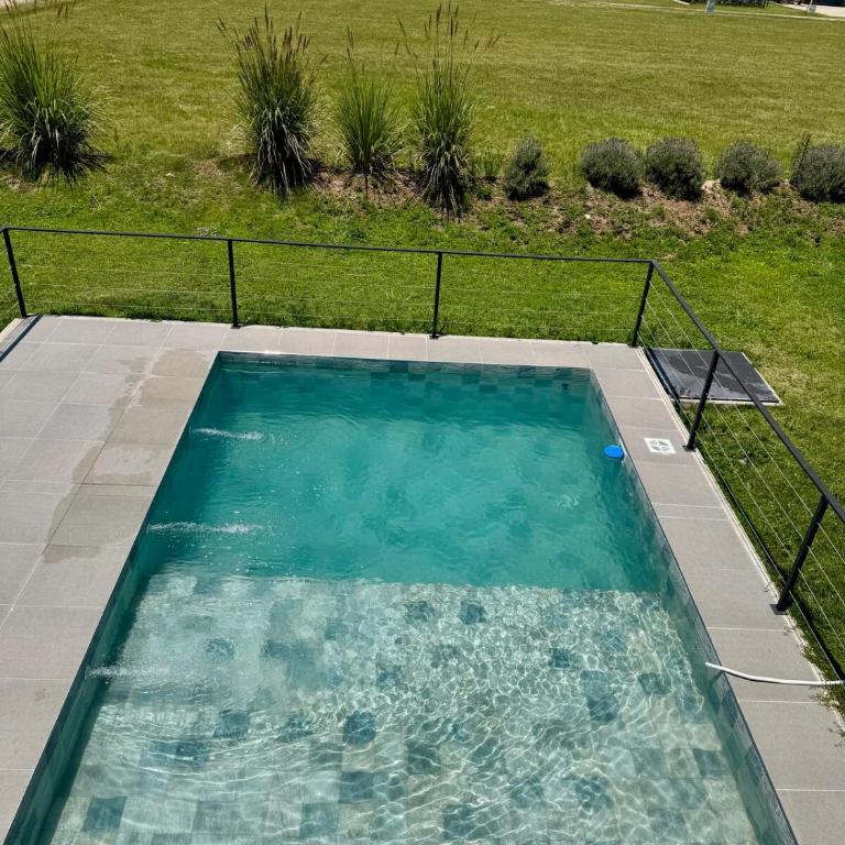Duplex con pileta frente a lago Los Molinos - Two-Bedroom House - 2