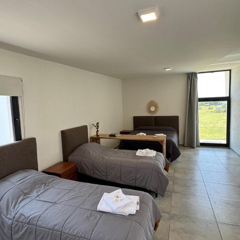 Duplex con pileta frente a lago Los Molinos - Two-Bedroom House - 58