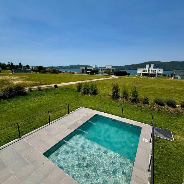 Duplex con pileta frente a lago Los Molinos - Two-Bedroom House - 63
