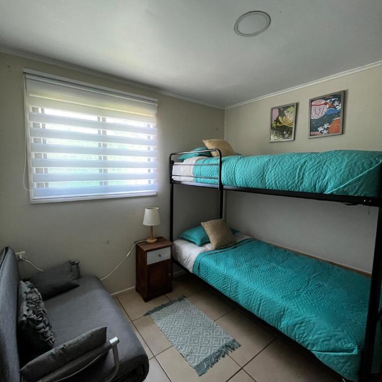 Mels House Batuco - Three-Bedroom House - 13