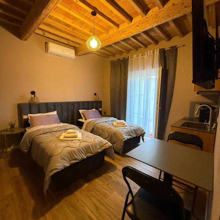 La Casa di Marsy - Camera Matrimoniale/Doppia con Letti Singoli con Terrazza - 2
