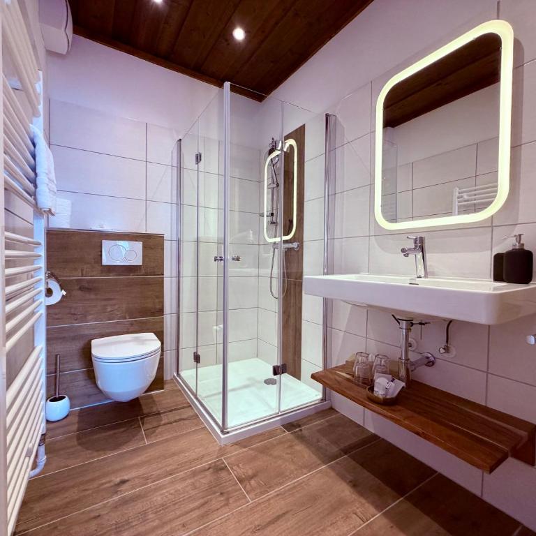 Boutique Hotel Alpenhof - Deluxe Vierbettzimmer - 3