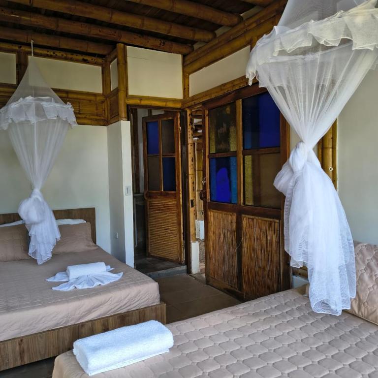 HOTEL Casa del Árbol ECOPARQUE CHINAUTA - Quadruple Room with Lake View - 3