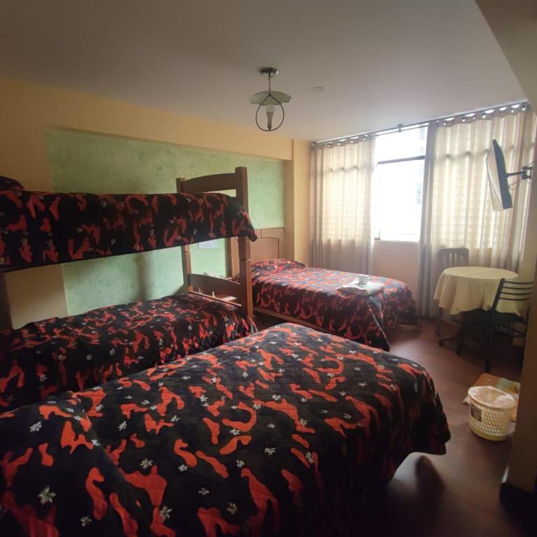 Hotel Savoy - Habitación Cuádruple Económica - 1