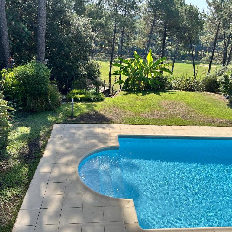 Villa Luxe piscine chauffée, 4 chambres, surplombant le golf entre océan & lac Plage à 5 min - Villa - 5