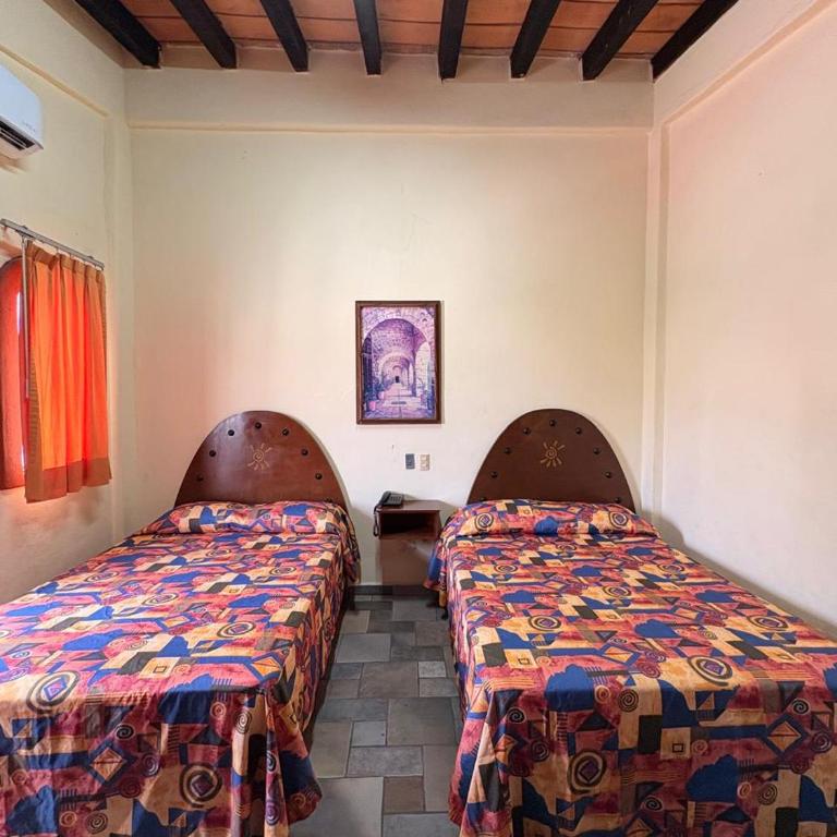 Mocali - Habitación Doble Estándar con 2 camas dobles - 4