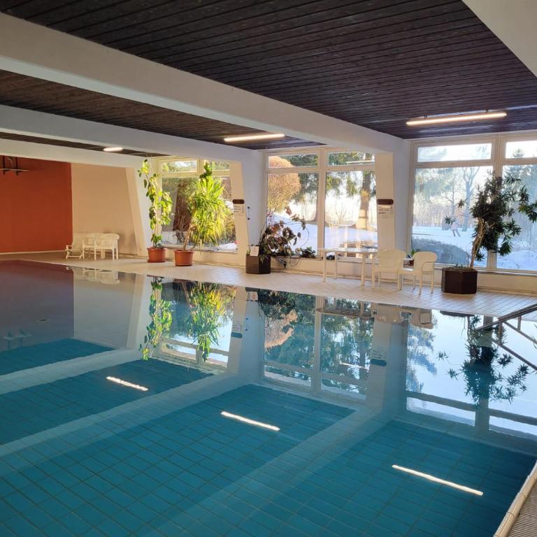 Waldfeder Apartment mit Pool und Fitnessraum, neu und vollsaniert - Apartment mit 1 Schlafzimmer und Blick auf den Park - 29