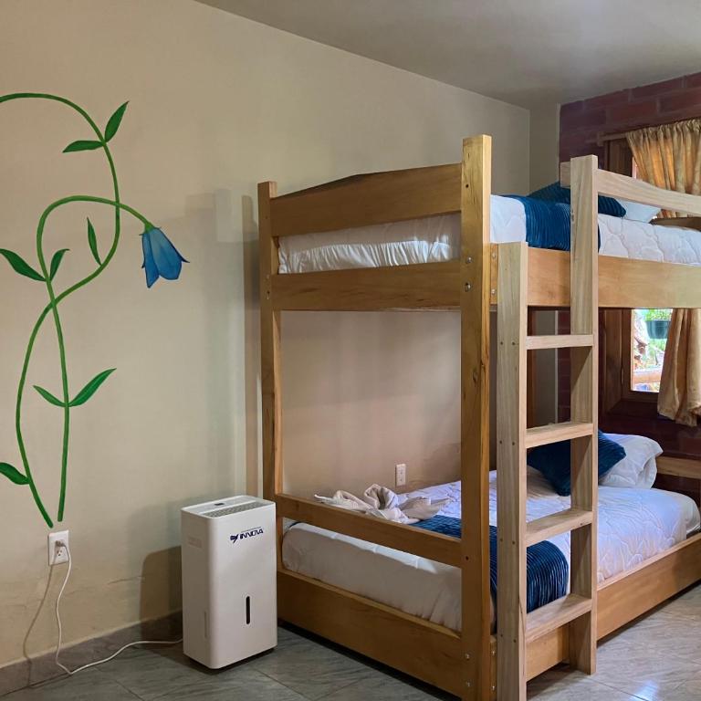 Casa del Rio en MINDO - Family Room with Garden View - 5