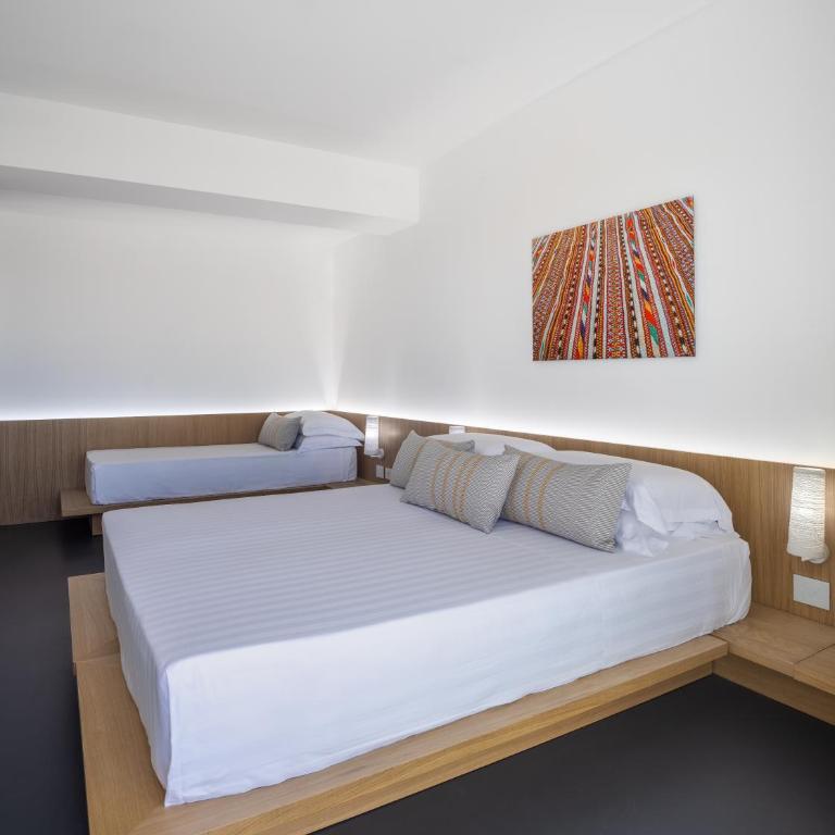 Hotel with swimming pool in Olbia - Habitación Triple Deluxe - 7