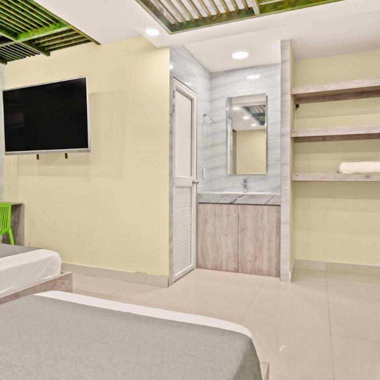 Aparta Hotel EcoSuite - Habitación Cuádruple Superior - 1