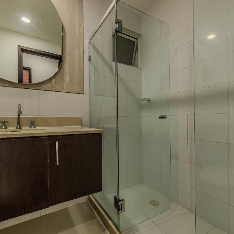 Oceanfront condominium with direct access to the beach. - Two-Bedroom Apartment with Balcony - 11