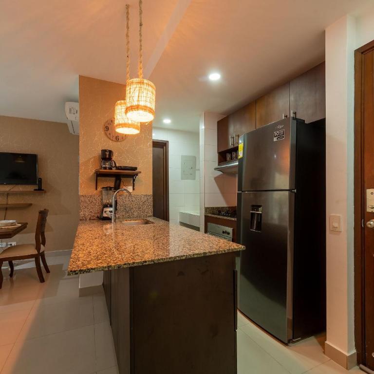 Oceanfront condominium with direct access to the beach. - Two-Bedroom Apartment with Balcony - 28
