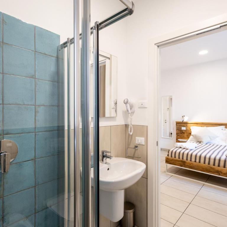 Le Sabbie B&B - Camere in villino a 50mt dal mare - Camera Matrimoniale con Vista Giardino - 10