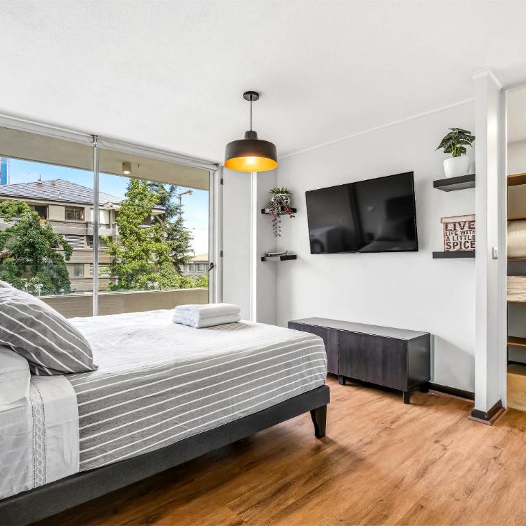 A pasos del Parque Arauco con AC - Apartment - 5