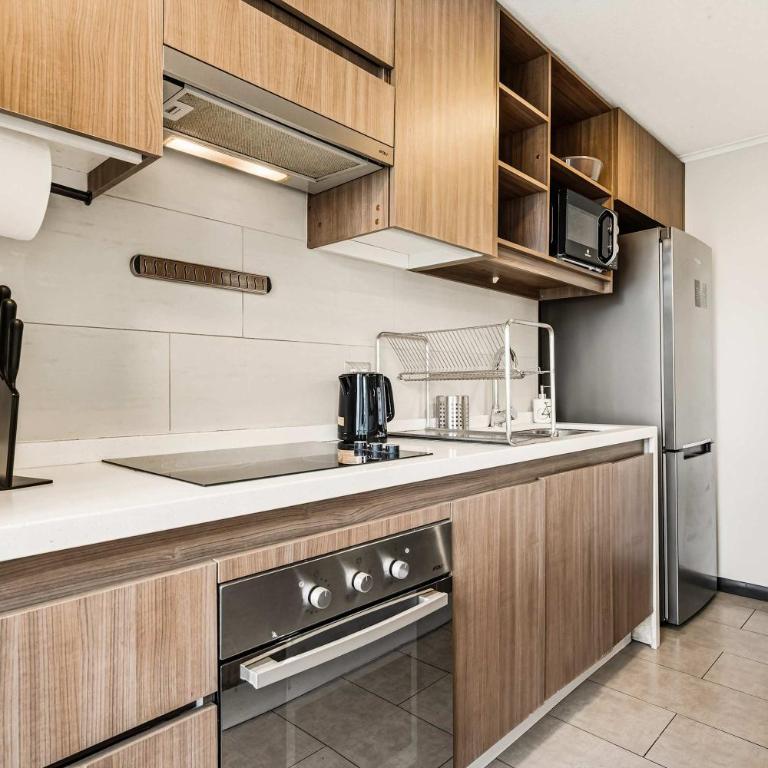 A pasos del Parque Arauco con AC - Apartment - 14