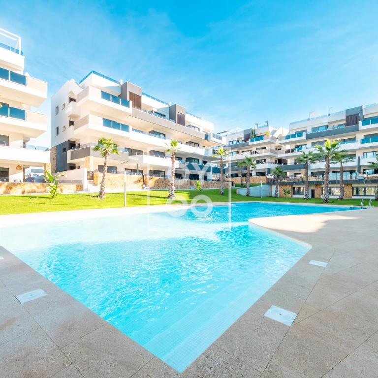 Orihuela Poolside Retreat, High-end apt, Pool views - by OYOOSTAYS - Apartamento Deluxe de 2 dormitorios con vistas al jardín - 23